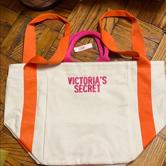 Victoria's Secret Handbags - NWT Victoria’s Secret travel bag size: 22” x 13.5”